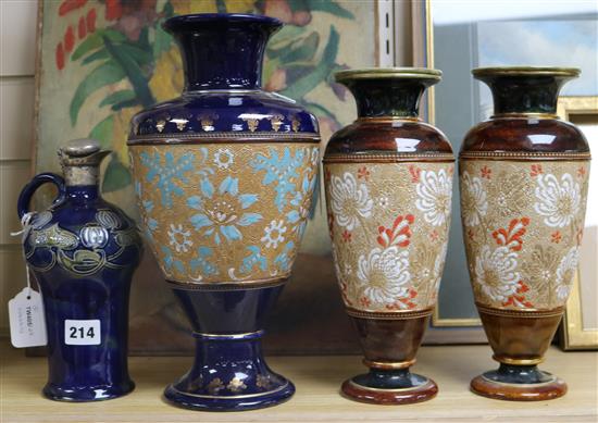 A pair of Doulton Lambeth Slaters Patent vases, another vase and a silver-mounted flask